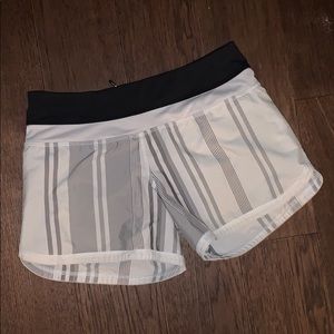 White striped Lululemon track shorts